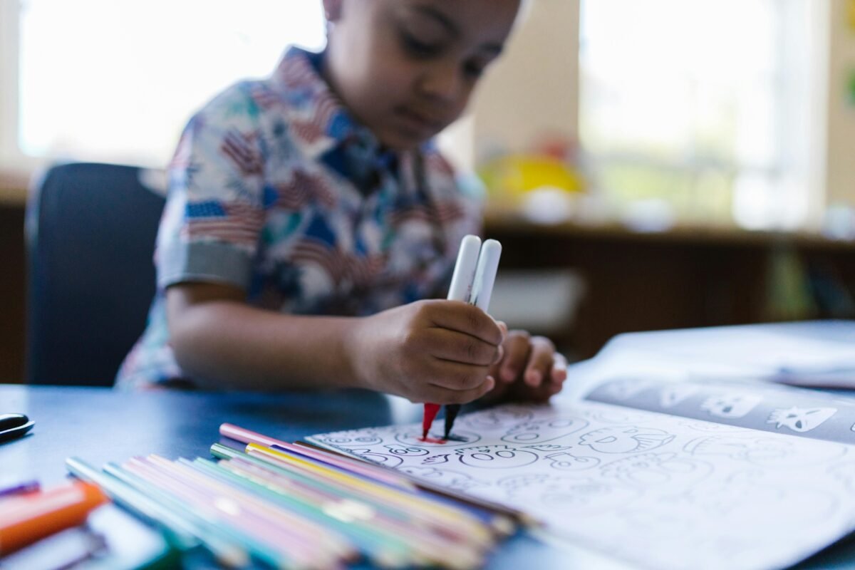 Young children enjoying task-based learning as part of their homeschool daily workload